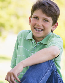 smiling boy with braces